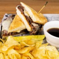 French Dip · Roast beef, Swiss cheese and au jus.