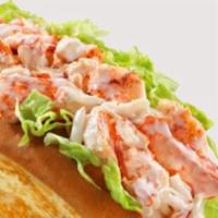 Lobster Roll · 100% real lobster lightly tossed with mayo and served on a bed of crisp lettuce.