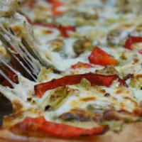 5. Mediterranean Pizza · Pesto sauce, mozzarella, feta, artichoke hearts, green olives, and red bell peppers.