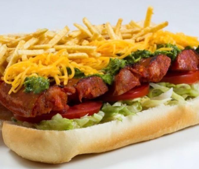 4. Choripan Sandwich · Sausage sandwich. Spanish chorizo- sausage, with mild chimichurri, basil mayo, cheddar cheese, tomatoes, lettuce, and potato sticks, mayo, and ketchup. Add french fries, tequenos, and drink for an additional charge.