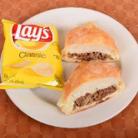 69. Philly Steak Sandwich · Steak, melted American cheese and sauteed onions.