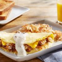 Southern Omelette · Country sausage, American cheese, shredded potatoes and onion topped with our signature saus...