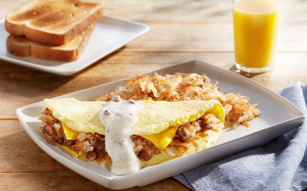 Southern Omelette · Country sausage, American cheese, shredded potatoes and onion topped with our signature sausage gravy.