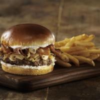 Mushroom Swiss Burger · fresh seasoned beef patty, swiss cheese, mushrooms, bacon strips, caramelized onions and gar...