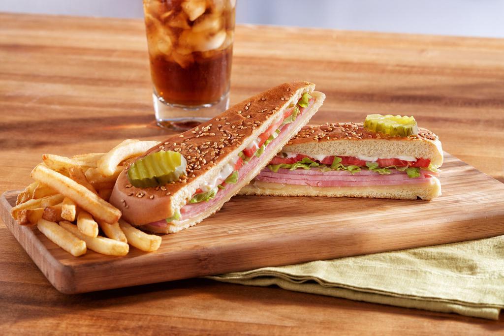 Famous Slim Jim Sandwich · Perfectly layered lean ham, Swiss cheese, tomato, lettuce and special sauce then grilled and pressed on a sesame seed roll.