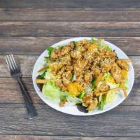 Sesame Asian Grilled Chicken Salad · Crisp garden greens with almonds, crispy tortilla strips, orange tangerines, grilled chicken...