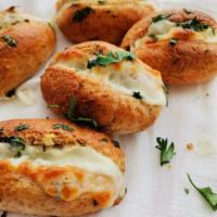 Garlic Bread · Buttery bread that is topped with garlic. 