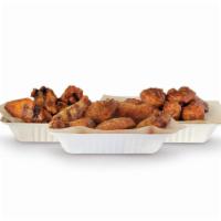 100 Pieces Pack · Choice of 100 crisp boneless wings, classic-bone-in, or a combination of boneless and bone-i...