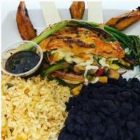 Pollo Domingero · Stuffed chicken breast served with fried plantains, black beans, rice , queso fresco 