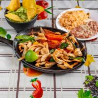 Fajitas (chicken) · Chicken fajitas cooked with bell peppers and grilled onions. Comes with sides of rice, beans...