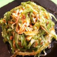 Crunchy Krab Salad · Kani, wakame, crispy rice, tempura, eel sauce