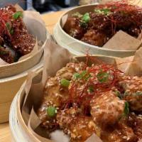 Chifa Chicken Wings · Deep fried, honey wasabi glaze, sesame, scallion, chili threads