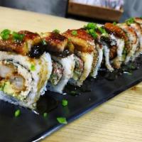 Akuma Roll · Kani mix, shrimp tempura, avocado, scallions, spicy eel top.