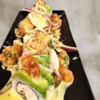Tiger Roll · Kani salad mix, avocado, crispy shrimp ceviche, aji amarillo.