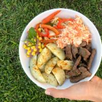 Cowlapse Bowl · Steak stripes, spicy potatoes, grilled veggies, coleslaw, beans puree and corn. Spicy.