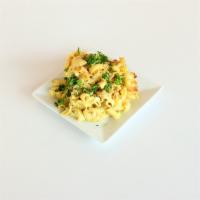 Vegan Mac N Cheez · An all time favorite, mixed with 3 vegan cheezes, and topped with fresh parsley.