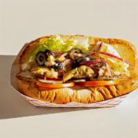 Grilled Chicken Sub Sandwich · Sub sandwich with lettuce, tomato, onions, olives, pickles, mayo and Italian dressing.