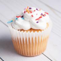 Buttersweet Vanilla Cupcake · Madagascar vanilla icing covering a freshly baked vanilla cupcake