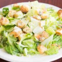 Caesar Salad · Romaine lettuce, croutons, and Parmigiana cheese.