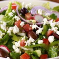Greek Salad · Lettuce, tomato, cucumbers, olives, pepperoncini, onion, and feta.