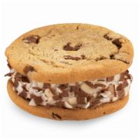 Perfect Duet Ice Cream Cookie Sandwich · Sweet Cream Ice Cream sandwiched by moist Chocolate Chip Cookies and rolled in Milk and Whit...