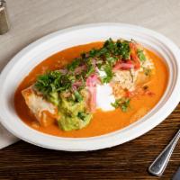 Special Mojado Wet Burrito · Choice of meat, rice, beans, topped with enchilada sauce, melted cheese, guacamole, sour cre...
