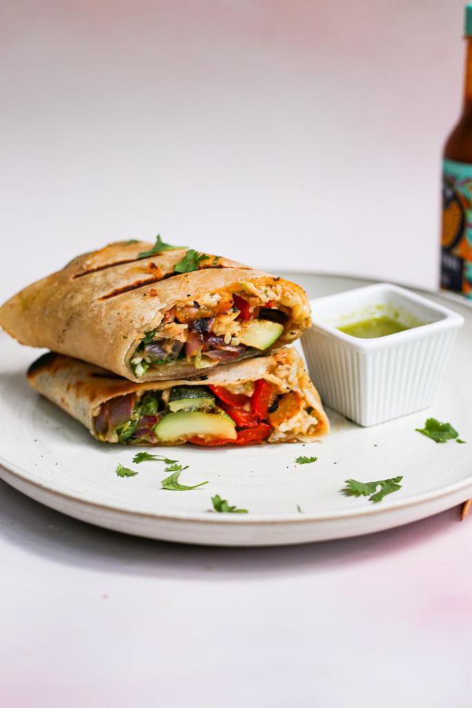 Grilled Vegetables Burrito · Mushrooms, red and green bell peppers, onions, rice, beans, lettuce and salsa. Vegetarian.