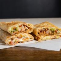 Super Quesadilla · Flour tortilla with any meat, guacamole, sour cream, cheese and salsa.
