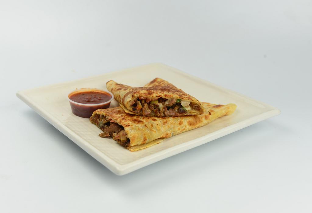 Quesadilla Suiza · Flour tortilla with choice of meat, cheese and salsa. 