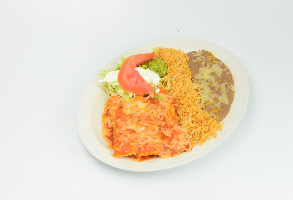 Enchiladas · Corn tortillas, any meat, rice, beans, sour cream, guacamole and salad.
