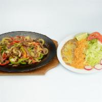 Fajitas Plate · Choice of grilled beef or chicken with grilled onions, peppers, rice, beans, guacamole, sour...