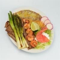 Steak and Prawn Plate · Steak, prawns, rice, beans, sour cream, guacamole, salad and tortillas. 