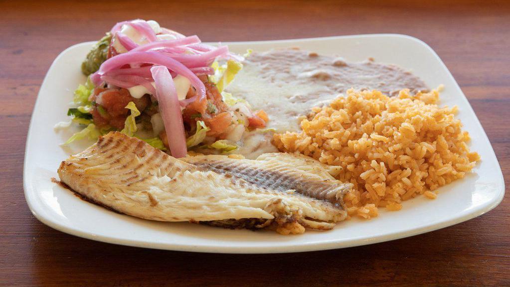 Filete de Pescado Plate · Breaded fish, rice, beans, sour cream, guacamole, salad and tortillas. 