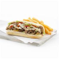 Philly Cheese Steak Sandwich · Melted Jack cheese, grilled onions and bell peppers. Served with tomato, lettuce, onions, pi...