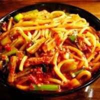 Spicy Stir-Fried Rice Noodle w/ Beef · regular spicy or extra spicy