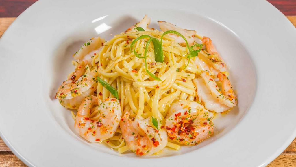 Shrimp Scampi · Loaded with garlícky shrimp and a rich lemon flavor over linguine, this pasta dish comes together easily and will disappear quickly. Serve with extra grated cheese on top.