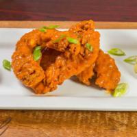 Chicken Tenders · Fried chicken tenders tossed in your choice of honey BBQ, sweet chili, Buffalo mild or Asian...