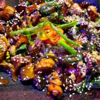 Kung Pao Shroom Trio · Garlic fried rice, kung pao sauce and mushroom trio (lions mains, shiitake, himeji). (Vegan)...