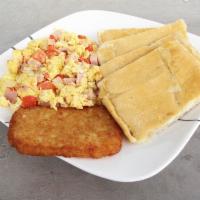 Eggs, Cheese and Tomato · Includes hashbrown and toast.