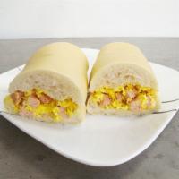 Omelet Sandwich · Eggs, ham and cheese.