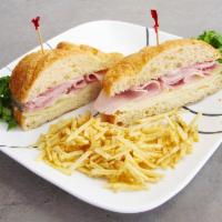 Croissant Sandwich · Ham and Swiss cheese.