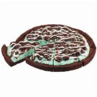 Mint Chocolate Chip Polar Pizza · A double fudge brownie crust with mint chocolate chip ice cream topped with Oreo cookie piec...