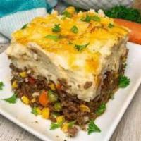 Sheppard Pie Baked Potato · Crisp potato with a soft center with the skin still on filled w ground beef or ground turkey...