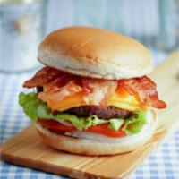 Bacon Cheeseburger · A 1/3lb. all beef patty served on toasted bun with tomatoes, lettuce. onions and dressing. C...
