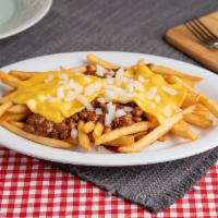 Chili Cheese Fries · French fries smothered in a rich and meaty chili topped with 2 thick slices of cheese. Add b...