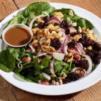 Michigan Cherry Salad · Spinach, red onion, walnuts, dried tart cherries, bacon and gorganzola cheese.