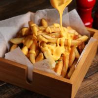 Cheese Fries · Crispy french fries drizzled with yummy cheese sauce