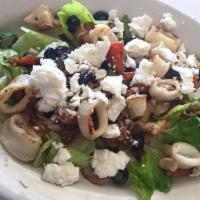 Mediterranean Calamari · Grilled calamari mixed with black olives, carrots, sun-dried tomato, celery and feta, served...