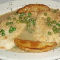 Chicken Vesuvio Dinner · Chicken simmered in a garlic and sherry wine sauce served with potatoes and peas.