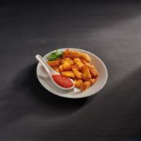 Cheese Curds · Breaded white cheddar cheese fried golden brown and served Piping hot with marinara. 